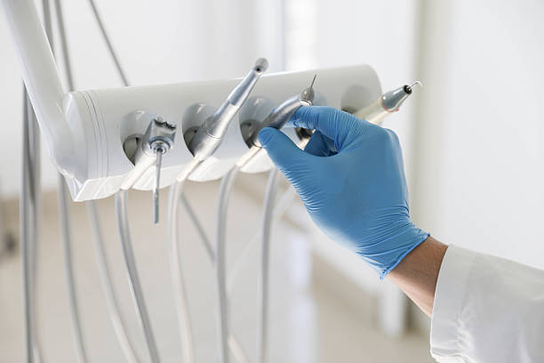 Professional Tooth Extraction technician working in New Hyde Park, NY